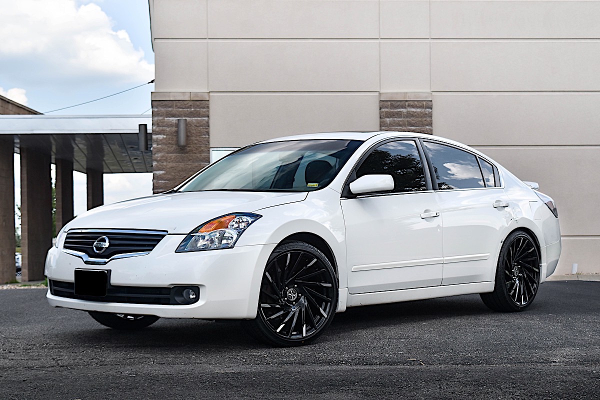 nissan altima white blacked out