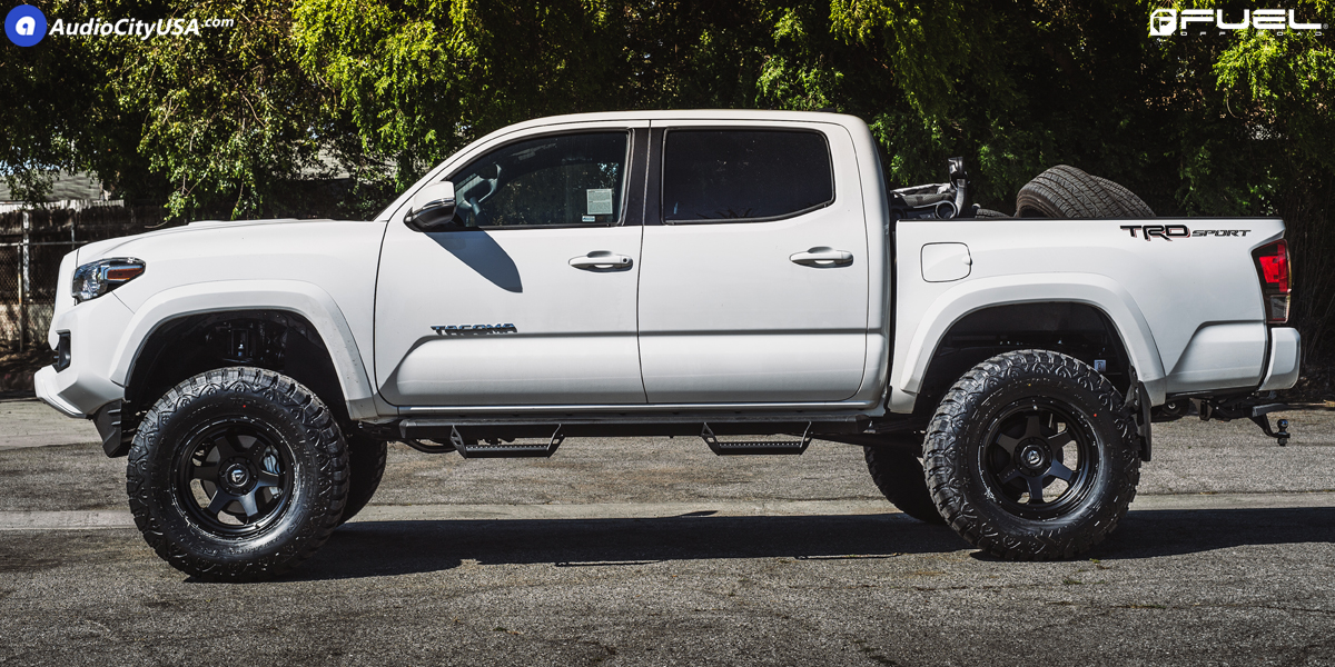 This Toyota Tacoma features Shok D664 shocks and Fuel OffRoad Wheels showcased in the gallery