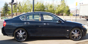 Infiniti M45 with Status Wheels S805 Game